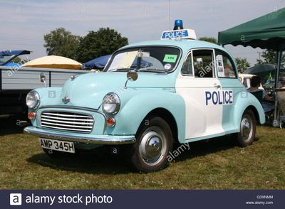 a-vintage-morris-minor-police-panda-car-at-a-classic-car-show-G3XNMM.jpg